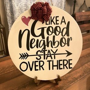 Like a good neighbor stay over there door hanger